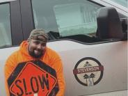 Devon with City Truck and slow sign